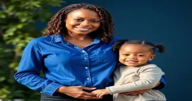 A single mom holding her child’s hand