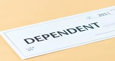 check with "DEPENDENT" stamped on it, for life insurance