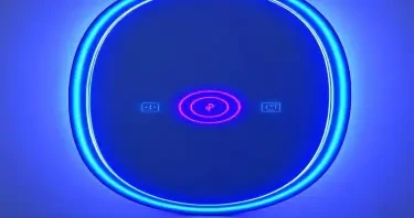 A tall oversized body length oval mirror with a flawless reflective surface, framed in polished black onyx. A wide electric blue LED ring surrounds the mirror near its edge, with a thinner purple ring nested inside. Between the rings, glowing symbols and interface glyphs pulse gently. The background is softly lit, allowing the mirror and its embedded data to shine clearly.