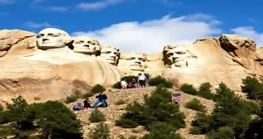 mount rushmore with the figures of the fantastic four