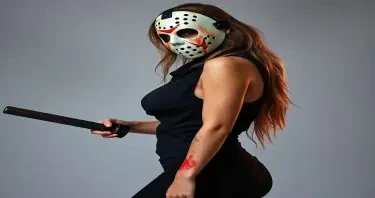 Create a 21 year old female Jason voorhees in their sexy form fitting costume